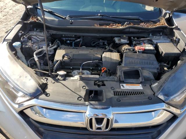 Photo 12 from auction – 2017 HONDA CR-V LX with VIN 7FARW5H35HE011353