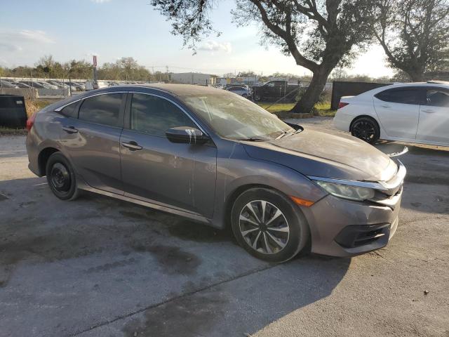 Photo 4 from auction – 2016 HONDA CIVIC LX with VIN 19XFC2F52GE010319