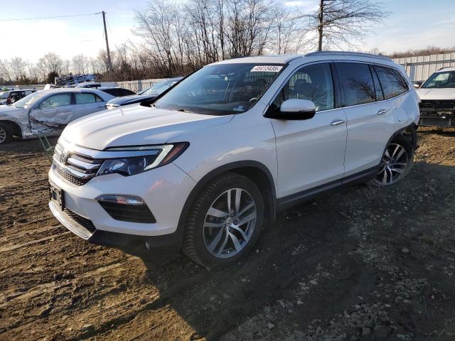 HONDA PILOT ELIT 2017 with VIN 5FNYF6H09HB098838 - Photo from auction