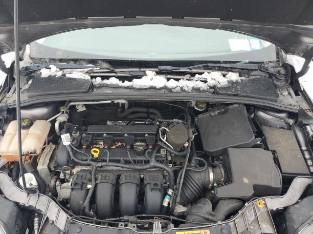 Photo 11 from auction – 2014 FORD FOCUS TITA with VIN 1FADP3J28EL201865