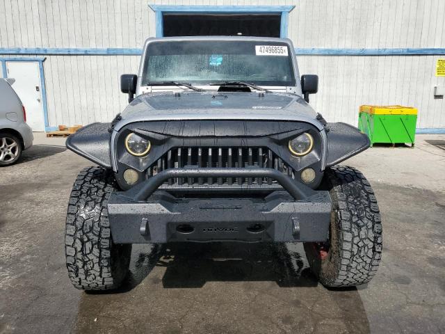 Photo 5 from auction – 2013 JEEP WRANGLER U with VIN 1C4BJWDG7DL599872