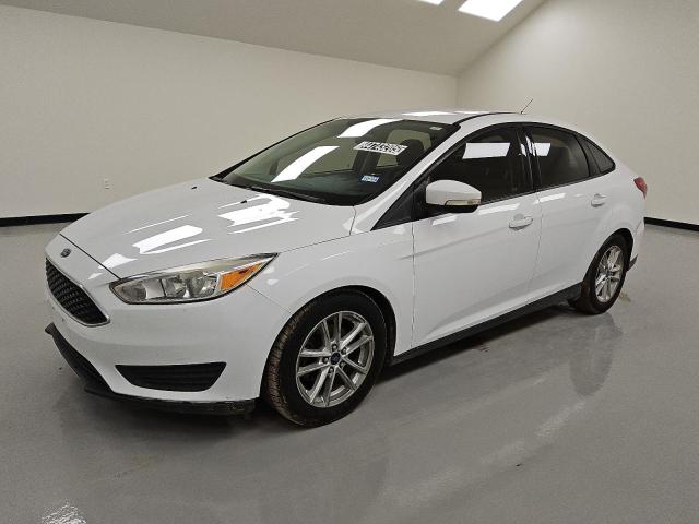 FORD FOCUS SE 2016 with VIN 1FADP3F27GL212237 - Photo from auction