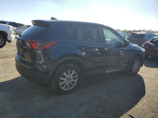 Photo 3 from auction – 2016 MAZDA CX-5 TOURI with VIN JM3KE4CY9G0653852