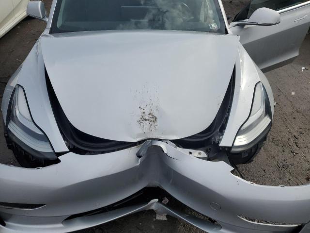 Photo 11 from auction – 2018 TESLA MODEL 3 with VIN 5YJ3E1EA7JF015264
