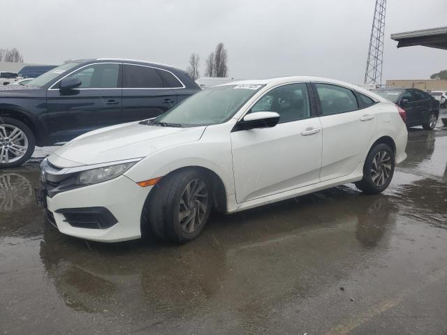 HONDA CIVIC EX 2018 with VIN 2HGFC2F76JH527069 - Photo from auction