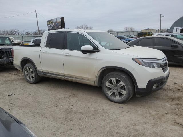Photo 4 from auction – 2019 HONDA RIDGELINE with VIN 5FPYK3F65KB008827