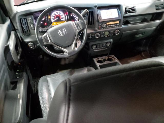 Photo 8 from auction – 2010 HONDA RIDGELINE with VIN 5FPYK1F59AB002068