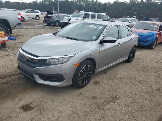 HONDA CIVIC LX 2017 with VIN 19XFC2F59HE033453 - Photo from auction