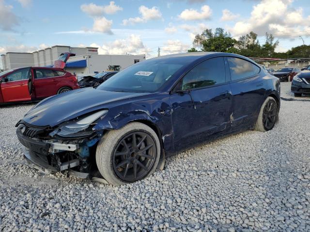 TESLA MODEL 3 2023 with VIN 5YJ3E1EAXPF566670 - Photo from auction