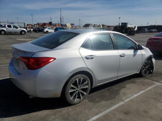 Photo 3 from auction – 2018 TOYOTA COROLLA L with VIN 5YFBURHE0JP780140