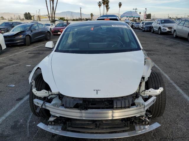 Photo 5 from auction – 2021 TESLA MODEL 3 with VIN 5YJ3E1EA1MF065940