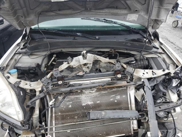 Photo 11 from auction – 2004 HONDA PILOT LX with VIN 2HKYF18124H555240