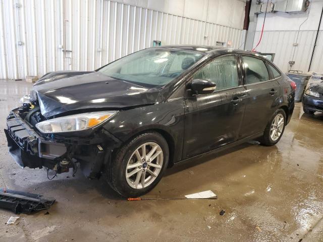 FORD FOCUS SE 2015 with VIN 1FADP3F29FL329140 - Photo from auction