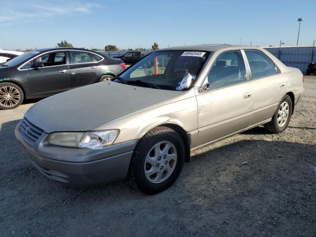 TOYOTA CAMRY LE 1997 with VIN JT2BF22K5V0009620 - Photo from auction