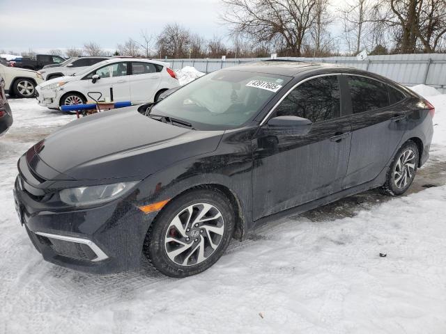 HONDA CIVIC EX 2019 with VIN 2HGFC2F71KH019819 - Photo from auction
