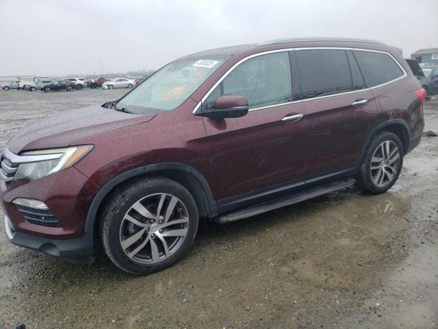 HONDA PILOT TOUR 2016 with VIN 5FNYF6H91GB057908 - Photo from auction