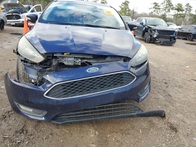 Photo 5 from auction – 2016 FORD FOCUS SE with VIN 1FADP3F25GL304527