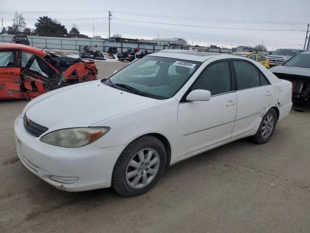 TOYOTA CAMRY 2002 with VIN JTDBF30K920023046 - Photo from auction
