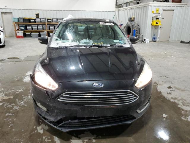Photo 5 from auction – 2015 FORD FOCUS TITA with VIN 1FADP3J24FL213545