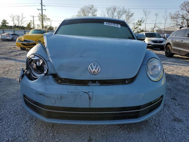 Photo 5 from auction – 2013 VOLKSWAGEN BEETLE with VIN 3VWJL7AT7DM676362