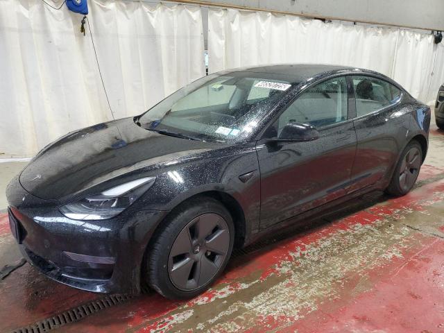 TESLA MODEL 3 2022 with VIN 5YJ3E1EA8NF369588 - Photo from auction