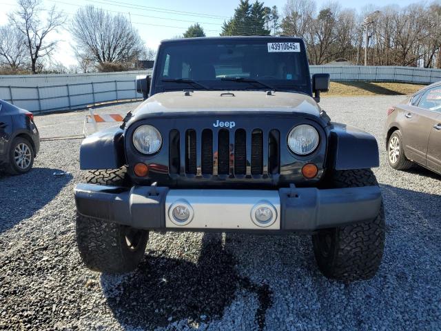 Photo 5 from auction – 2011 JEEP WRANGLER U with VIN 1J4BA5H13BL635449