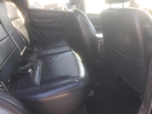 Photo 11 from auction – 2004 FORD ESCAPE LIM with VIN 1FMCU94124KA51594