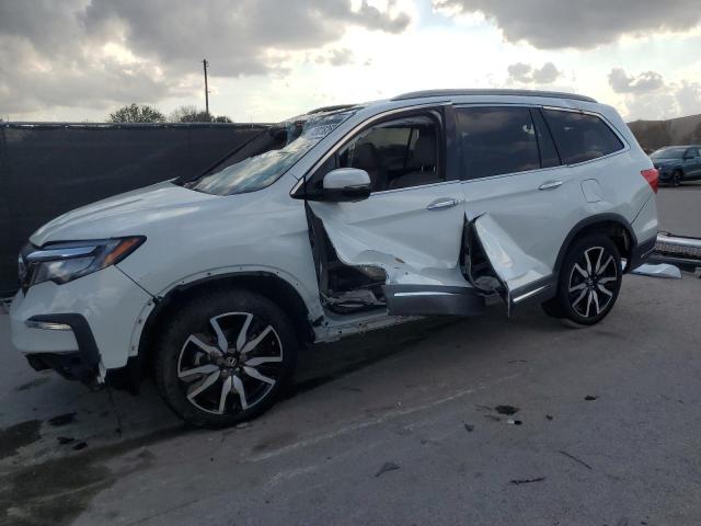 HONDA PILOT ELIT 2021 with VIN 5FNYF6H00MB064376 - Photo from auction
