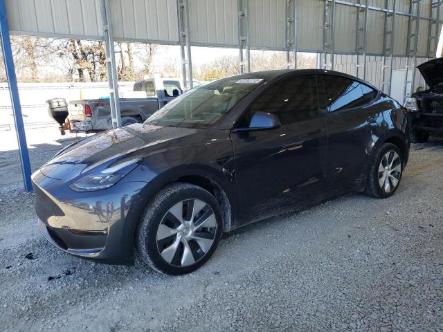 TESLA MODEL Y 2023 with VIN 7SAYGDED4PF960650 - Photo from auction