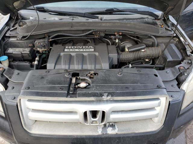 Photo 12 from auction – 2006 HONDA PILOT EX with VIN 2HKYF186X6H506883