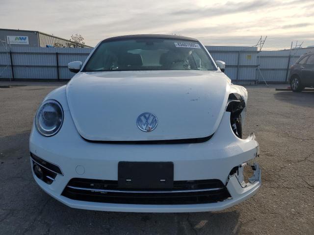 Photo 5 from auction – 2019 VOLKSWAGEN BEETLE SE with VIN 3VWJD7AT9KM720369