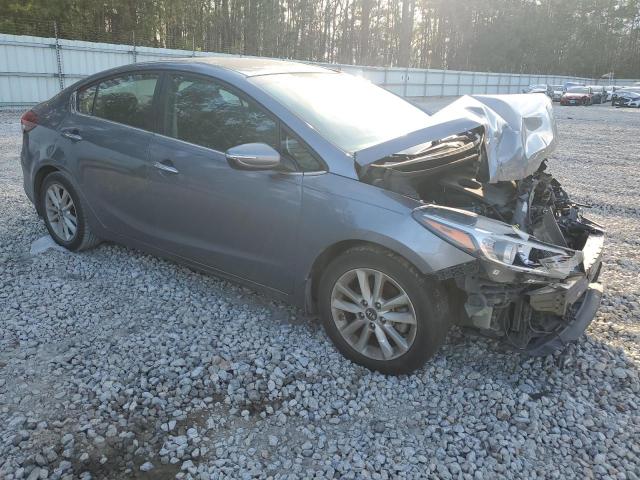 Photo 4 from auction – 2017 KIA FORTE LX with VIN 3KPFL4A71HE051112