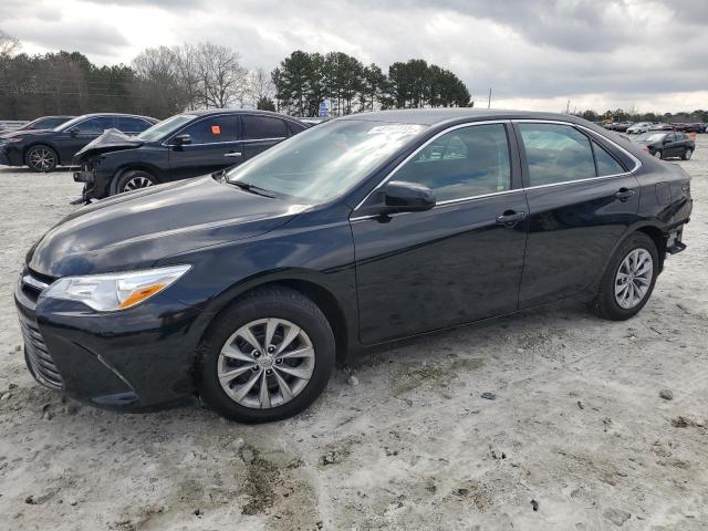 TOYOTA CAMRY LE 2016 with VIN 4T1BF1FKXGU256554 - Photo from auction