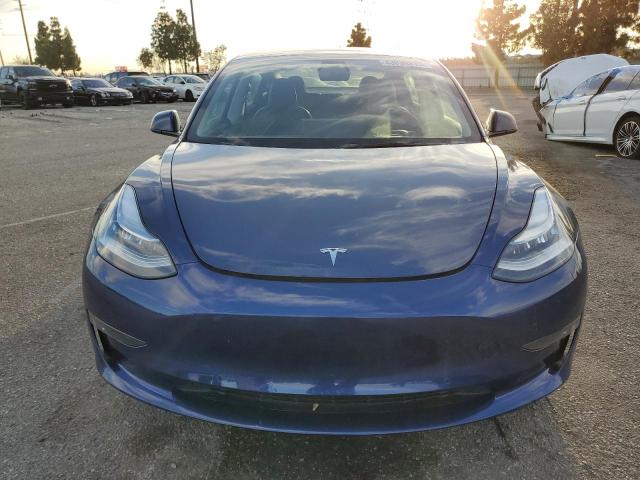 Photo 5 from auction – 2022 TESLA MODEL 3 with VIN 5YJ3E1EB7NF299736