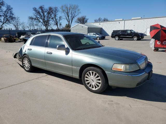 Photo 4 from auction – 2004 LINCOLN TOWN CAR E with VIN 1LNHM81W14Y667848