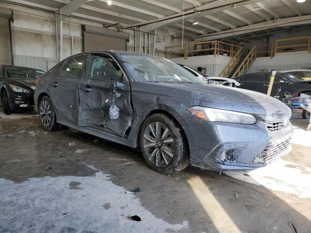 Photo 4 from auction – 2022 HONDA CIVIC EX with VIN JHMFE1F74NX009173