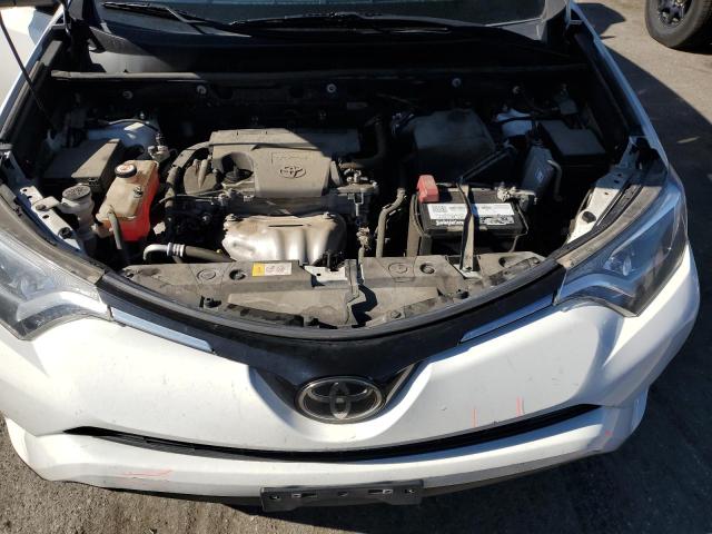 Photo 12 from auction – 2018 TOYOTA RAV4 LE with VIN JTMZFREV7JJ167501