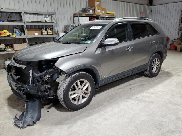 KIA SORENTO LX 2014 with VIN 5XYKTCA64EG509272 - Photo from auction