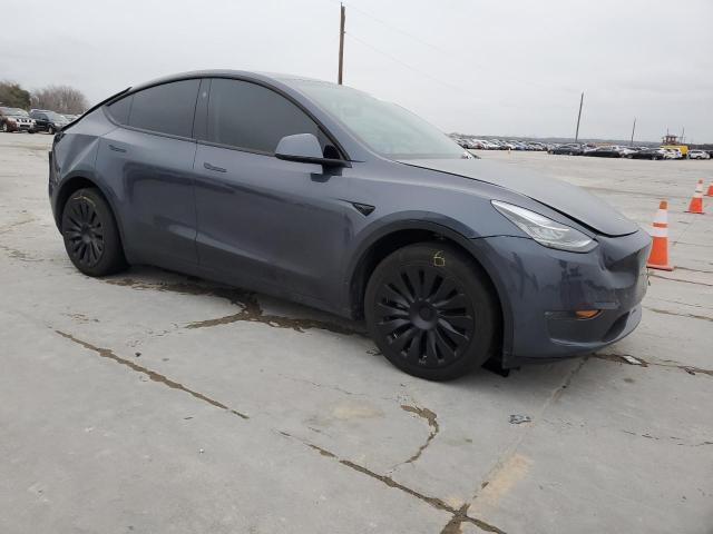 Снимка 4 от търг – 2023 TESLA MODEL Y с VIN 7SAYGDEE4PA157228