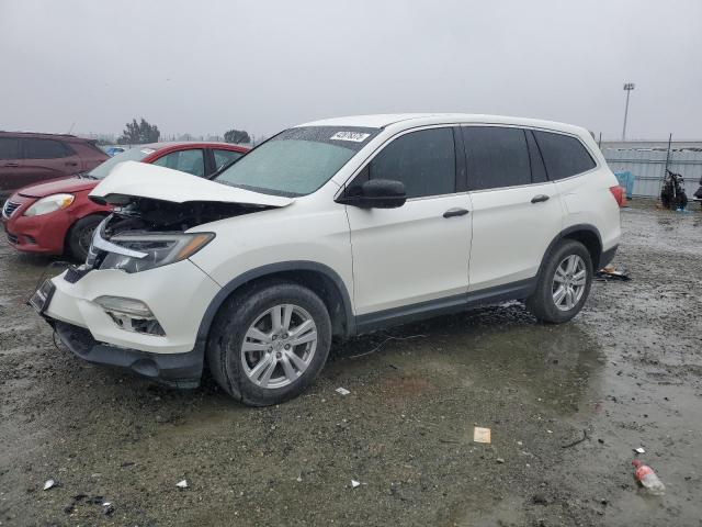 HONDA PILOT LX 2016 with VIN 5FNYF5H13GB007984 - Photo from auction