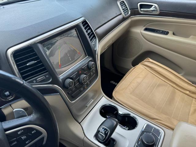 Photo 10 from auction – 2014 JEEP GRAND CHER with VIN 1C4RJFBM2EC315721