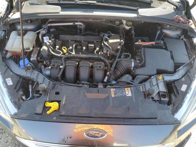 Photo 12 from auction – 2015 FORD FOCUS TITA with VIN 1FADP3N28FL262029