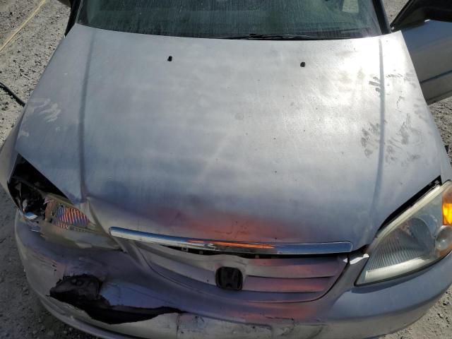 Photo 11 from auction – 2003 HONDA CIVIC LX with VIN 2HGES16593H520885