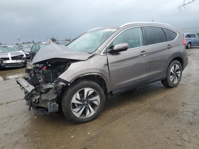 HONDA CR-V TOURI 2016 with VIN 5J6RM3H95GL007576 - Photo from auction