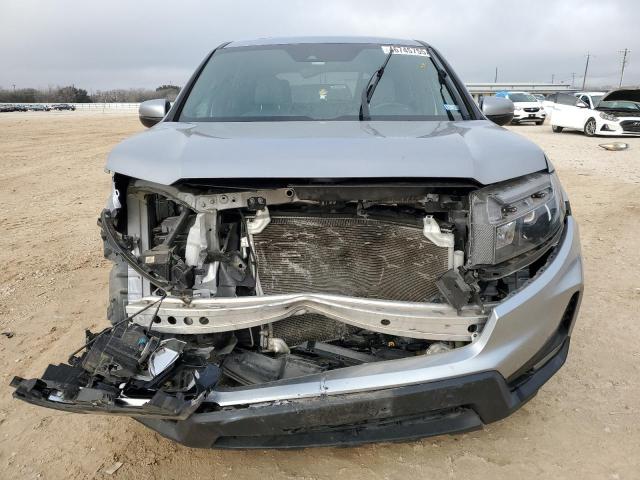 Photo 5 from auction – 2022 HONDA PASSPORT E with VIN 5FNYF8H52NB018704