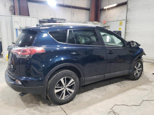 Photo 3 from auction – 2017 TOYOTA RAV4 XLE with VIN 2T3RFREV5HW620929
