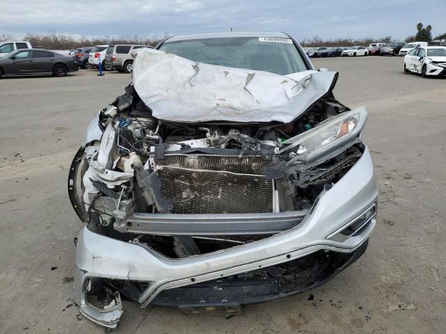 Photo 5 from auction – 2015 HONDA CR-V EX with VIN 3CZRM3H54FG705010