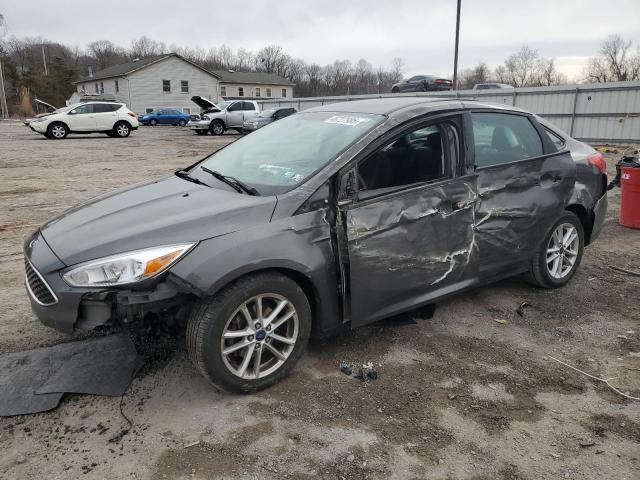 FORD FOCUS SE 2015 with VIN 1FADP3F20FL381434 - Photo from auction