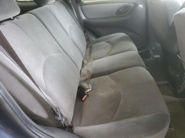 Photo 11 from auction – 2003 MAZDA TRIBUTE LX with VIN 4F2YZ04143KM01619