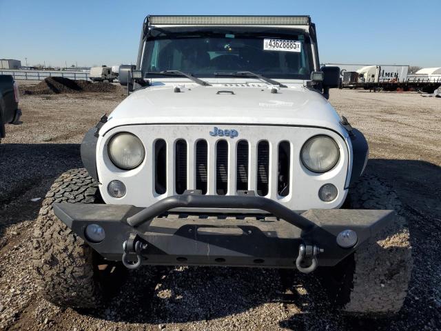 Photo 5 from auction – 2014 JEEP WRANGLER U with VIN 1C4BJWDG0EL257844
